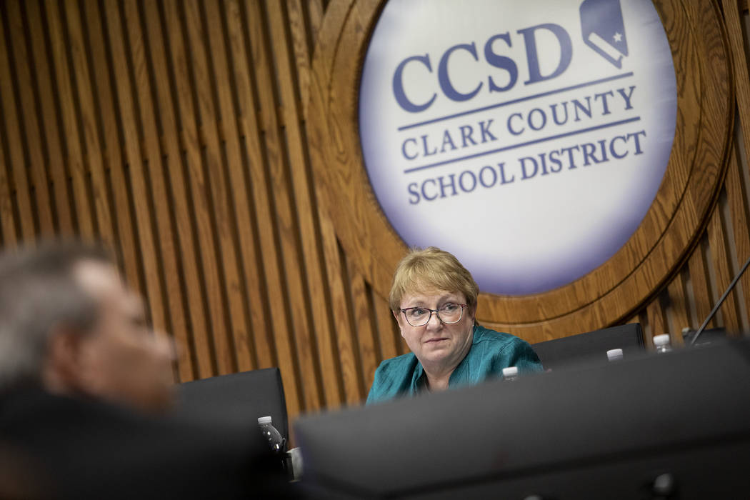 Clark County School District Board of Trustees member Chris Garvey, District B, listens as a me ...