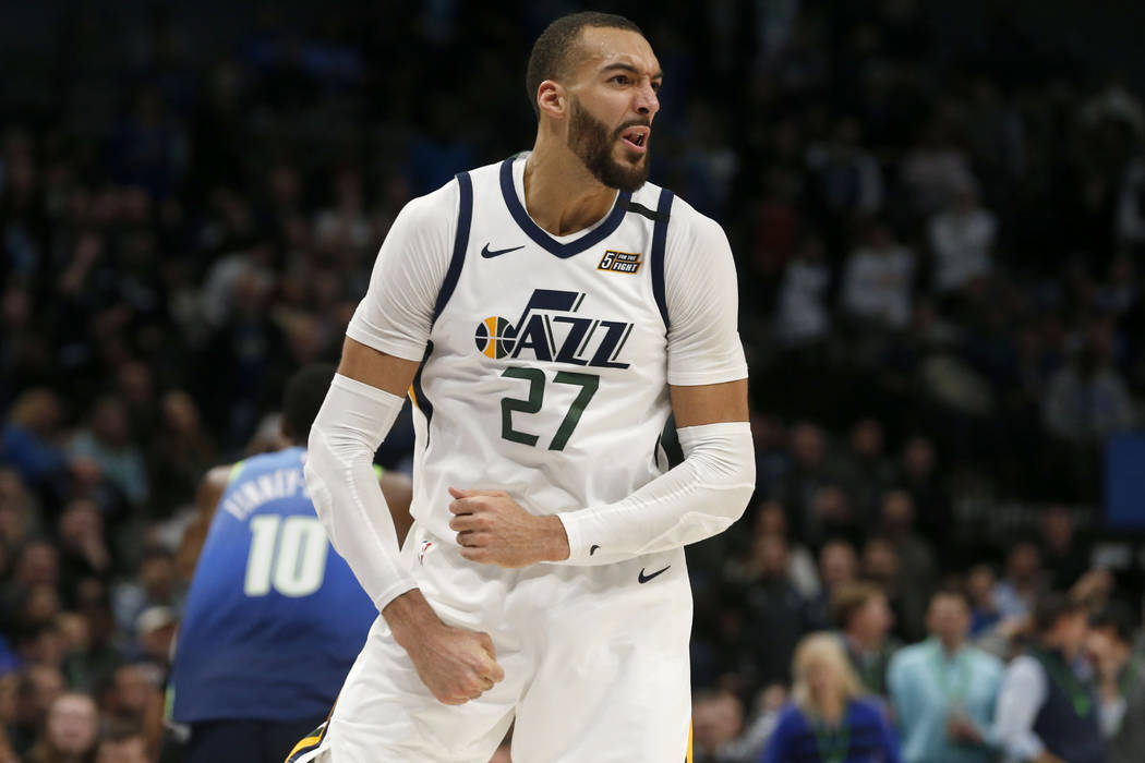 Utah Jazz center Rudy Gobert (27) celebrates a dunk against the Dallas Mavericks during the sec ...