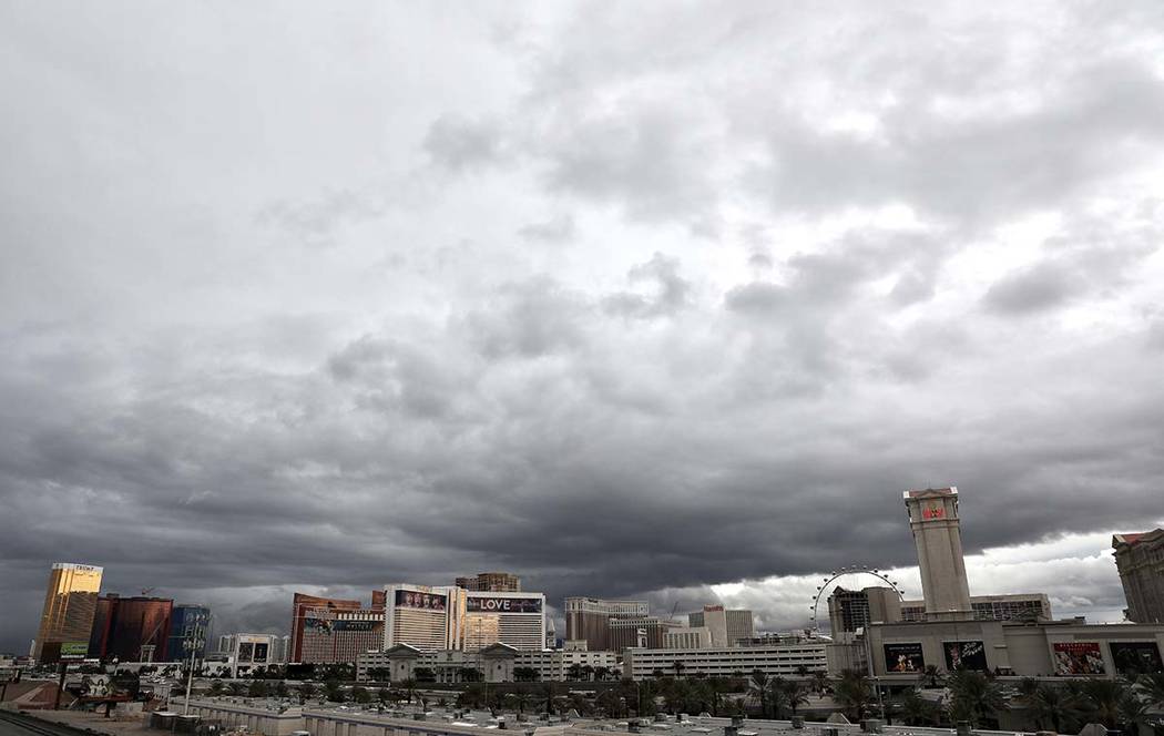 The Las Vegas strip an overnight rain on Friday, March 13, 2020. (Elizabeth Page Brumley/Las Ve ...