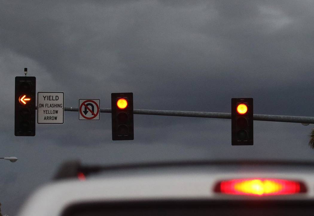 Clouds linger over the Las Vegas valley as seen from St. Rose Parkway on Friday, March 13, 2020 ...