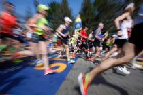 An April 17, 2017, file photo, shows runners crossing the Boston Marathon start line in Hopkint ...