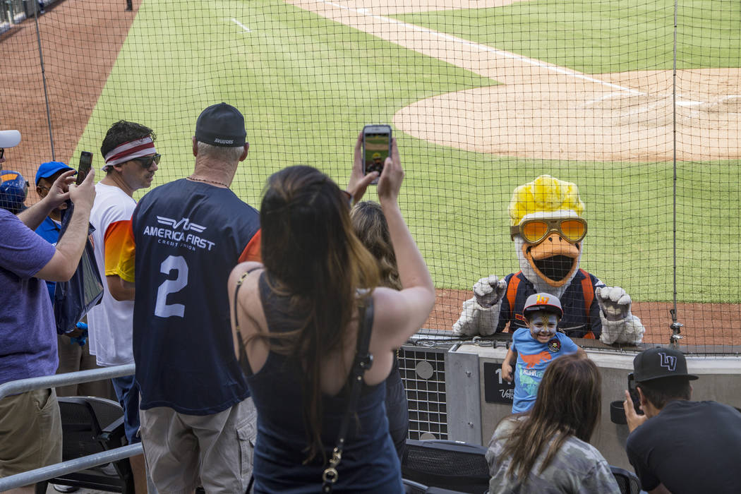 The Spruce the Goose mascot takes photos with fans at the Las Vegas Ballpark in Downtown Summer ...