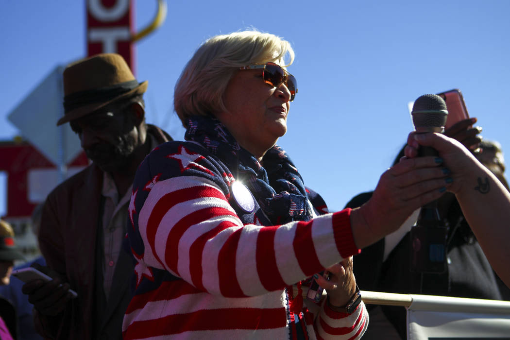 Roberta Lange, chairwoman of the Nevada State Democratic Party, gathers with demonstrators to m ...