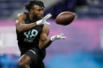 Ohio State defensive back Jordan Fuller runs a drill at the NFL football scouting combine in In ...