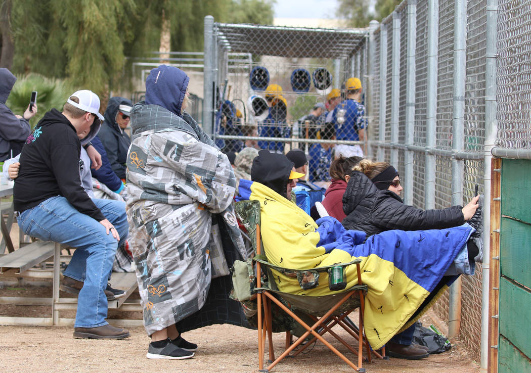 Parents watch a baseball game between Pahranagat Valley High School and Lincoln County High at ...