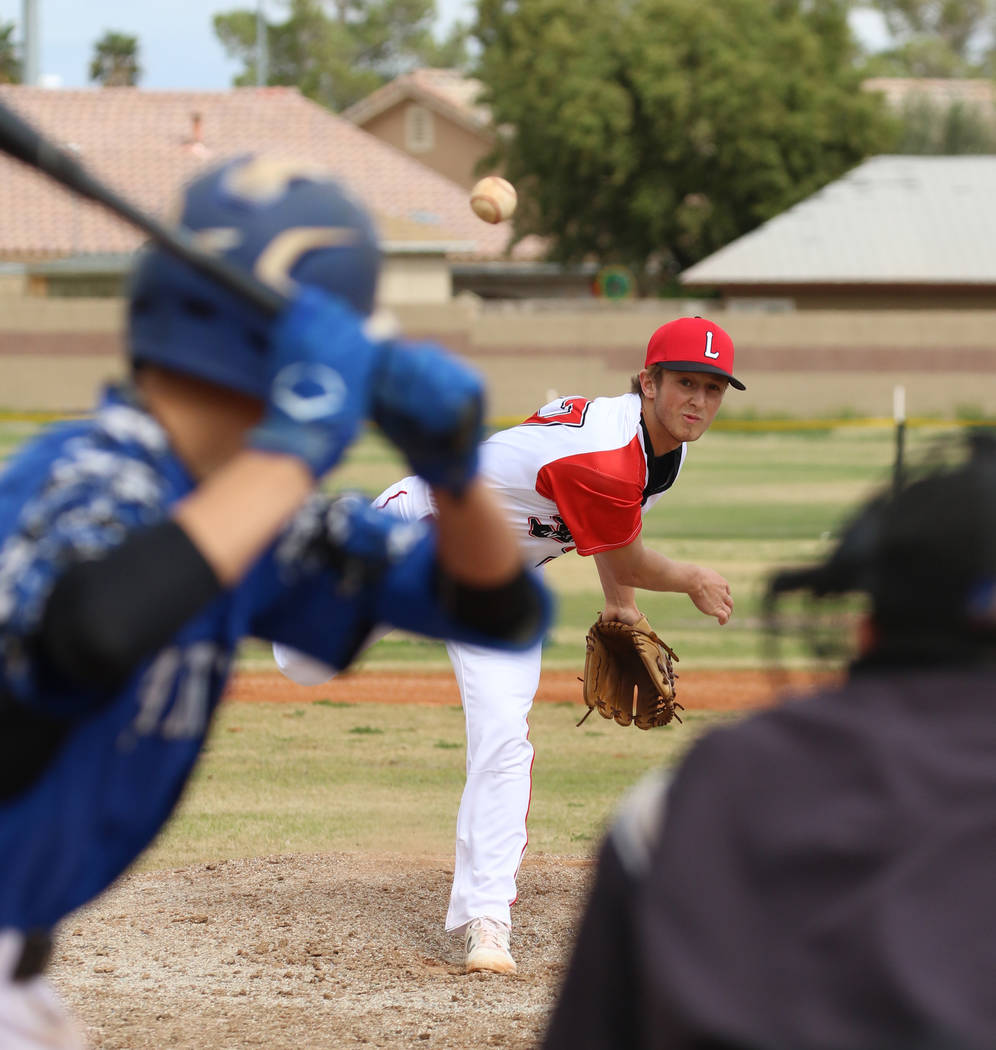 Lincoln County High's Mason Thornock pitches against Pahranagat Valley High School's Gage Davis ...