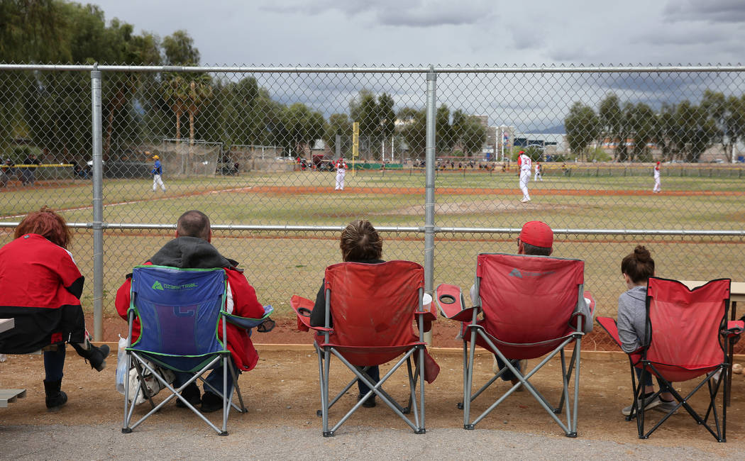 Parents watch a baseball game between Pahranagat Valley High School and Lincoln County High dur ...