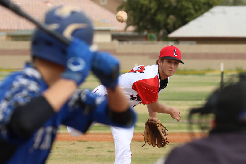 Lincoln County High's Mason Thornock pitches against Pahranagat Valley High School's Gage Davis ...