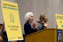 Los Angeles County Public Health Director Barbara Ferrer, left, takes questions at a news confe ...