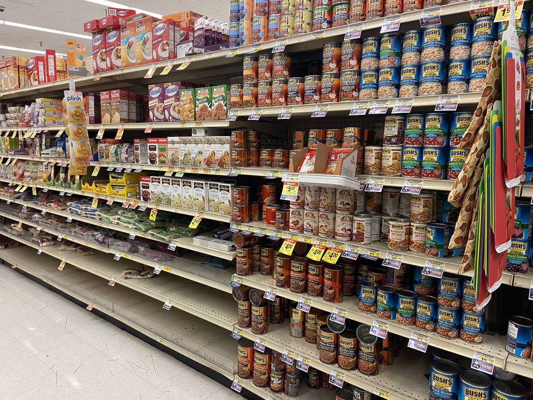 The rice shelf is almost empty at Albertsons on Charleston Boulevard in Las Vegas, Friday, Mar ...