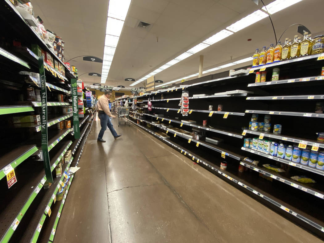 Empty shelves are seen at the Smith's at 1000 N Green Valley Pkwy in Henderson, Friday, March ...