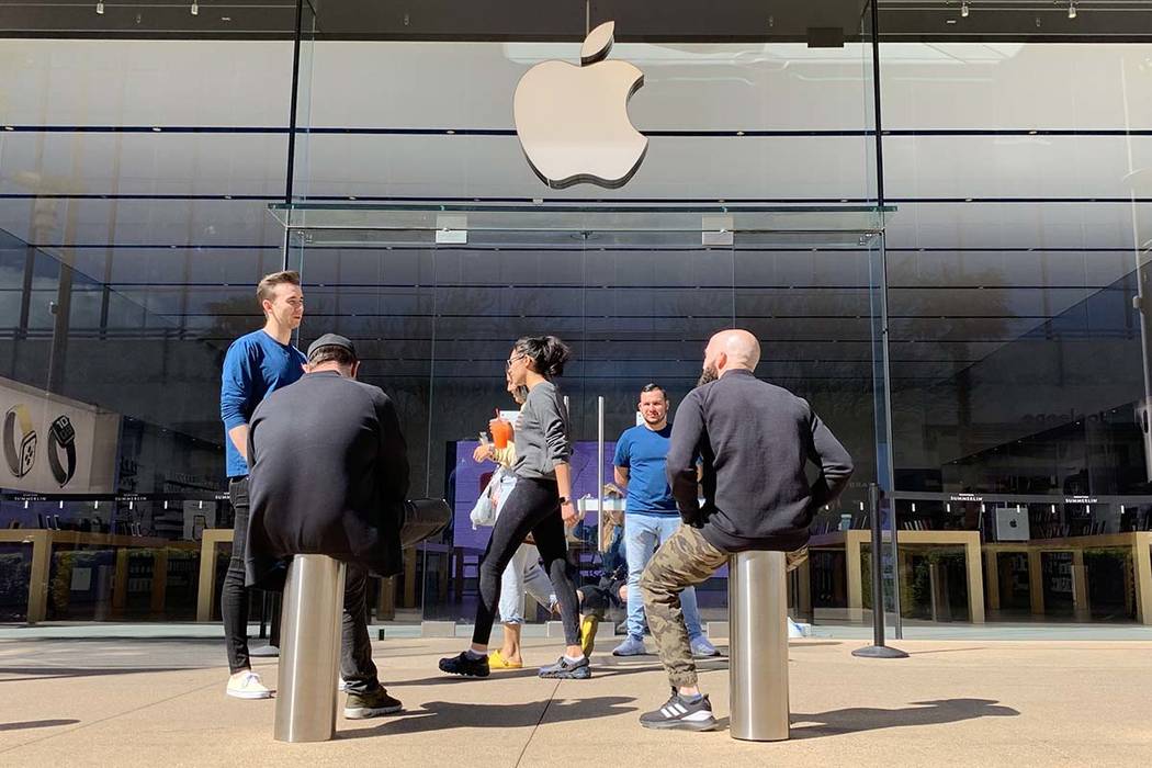 Staff at the Apple Store in downtown Summerlin alert customers