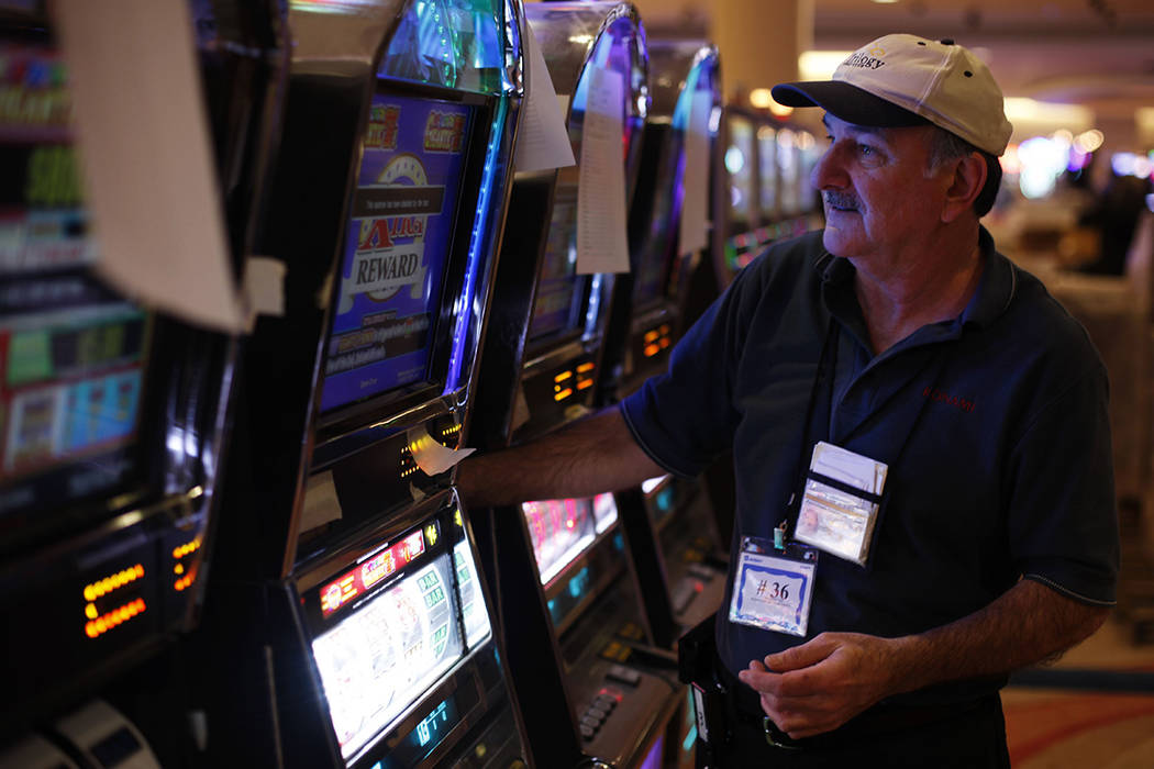 Bob Genereux, 58, works a gaming machine at the Valley Forge Casino Resort on Tuesday, Feb. 28, ...