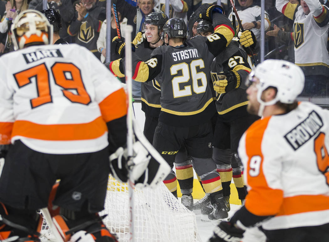 Vegas Golden Knights center Paul Stastny (26) celebrates with Vegas Golden Knights left wing Ma ...