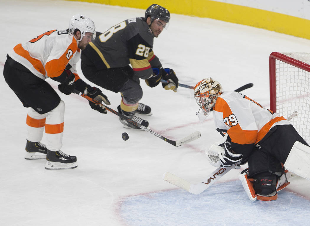 Vegas Golden Knights left wing William Carrier (28) shoots on Philadelphia Flyers goaltender Ca ...