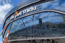 Yesco crews removed the "m" on the Allegiant Stadium sign Sunday, March 15, 2020, to readjust i ...