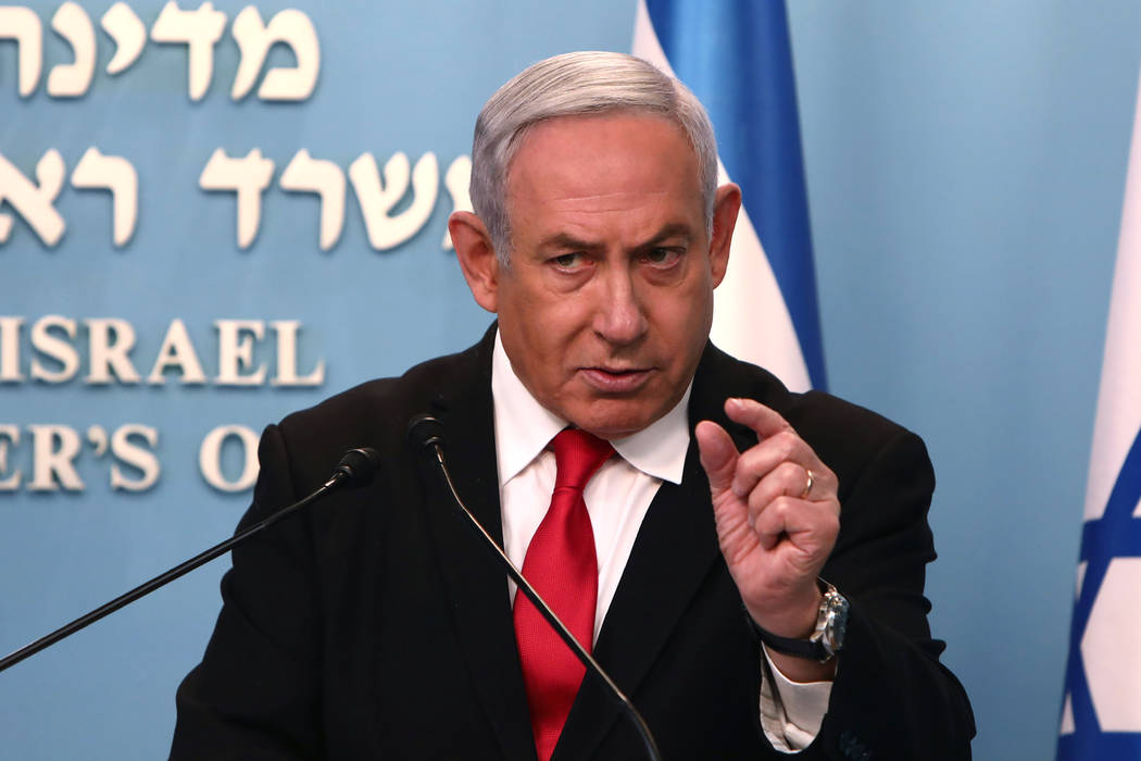 Prime Minister Benjamin Netanyahu delivers a speech from his Jerusalem office on Saturday, Marc ...