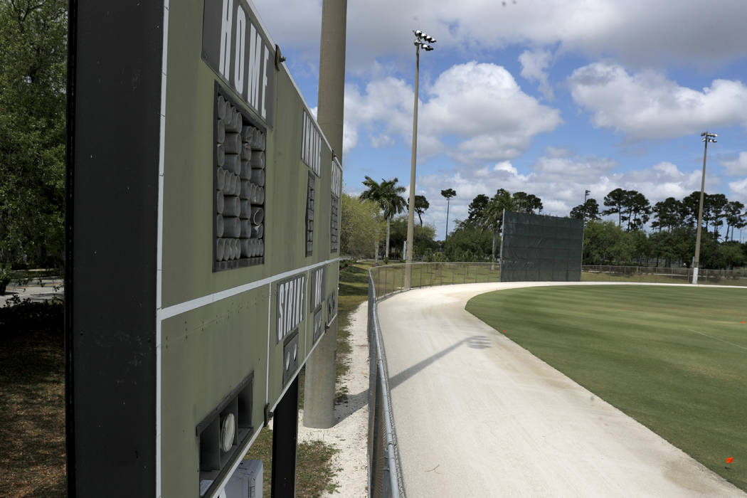 An empty practice field is seen at the Miami Marlins spring training baseball facility, Monday, ...