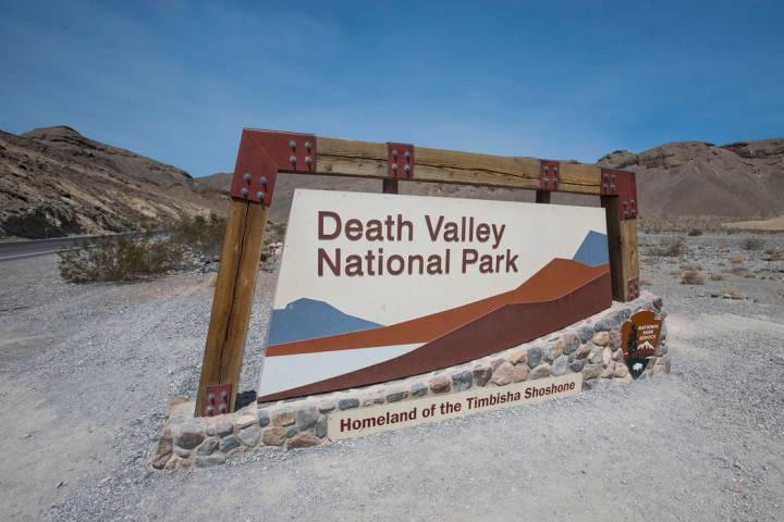 A sign marks the entrance to Death Valley National Park, Calif., on Thursday, July 26, 2018. Ri ...