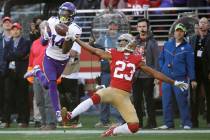 In this Jan. 11, 2020, file photo, Minnesota Vikings wide receiver Stefon Diggs (14) catches a ...