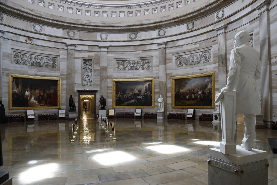 The U.S. Capitol Rotunda sits empty on Capitol Hill in Washington, Monday, March 16, 2020. Cong ...