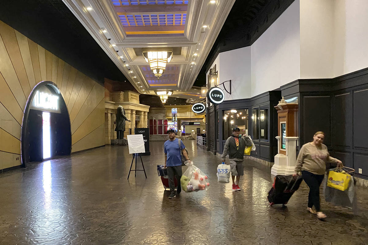 Guests depart Mandalay Bay on the Strip in Las Vegas Tuesday, March 17, 2020. (K.M. Cannon/Las ...