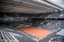 Construction work of the newly built roof of the Philippe Chatrier center court is pictured at ...