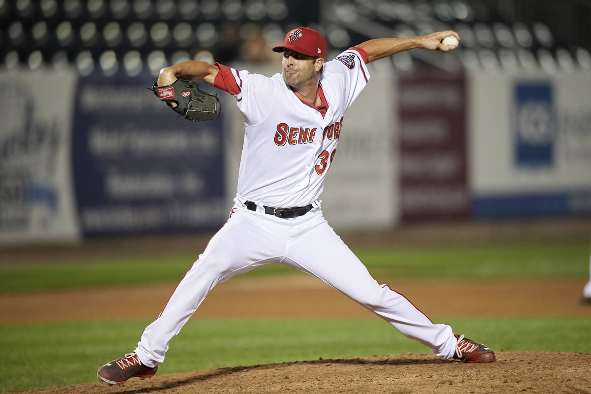 Harrisburg Senators relief pitcher Bryan Harper (39) delivers a pitch during a game against the ...