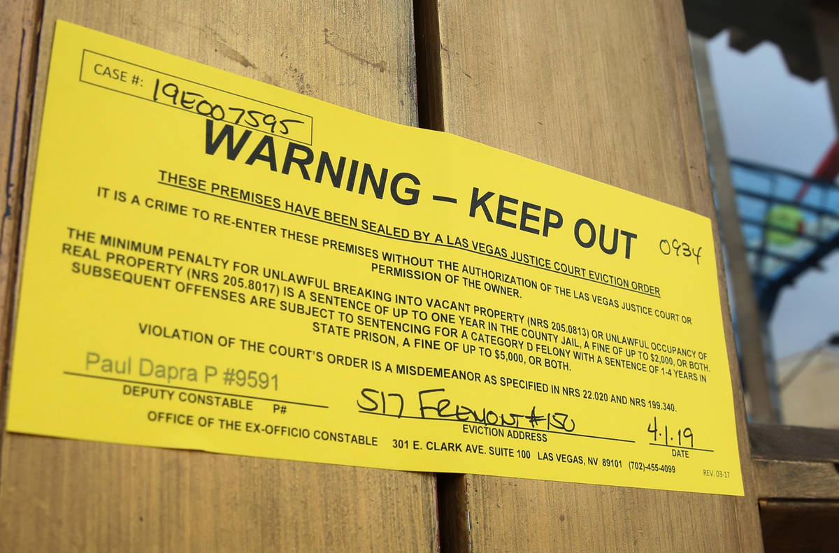 An eviction notice is seen placed on the door at Beauty Bar on Monday, April 1, 2019, in Las Ve ...