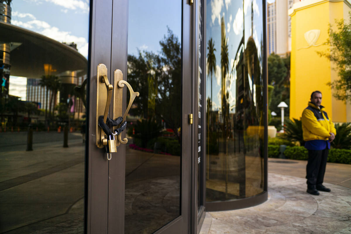 An entrance to Wynn Las Vegas is locked as the resort shuts down operations in Las Vegas on Tue ...