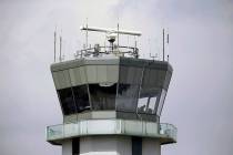 FILE - This March 12, 2013 photo shows the air traffic control tower at Chicago's Midway Intern ...