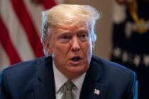 President Donald Trump speaks during a meeting with tourism industry executives about the coron ...