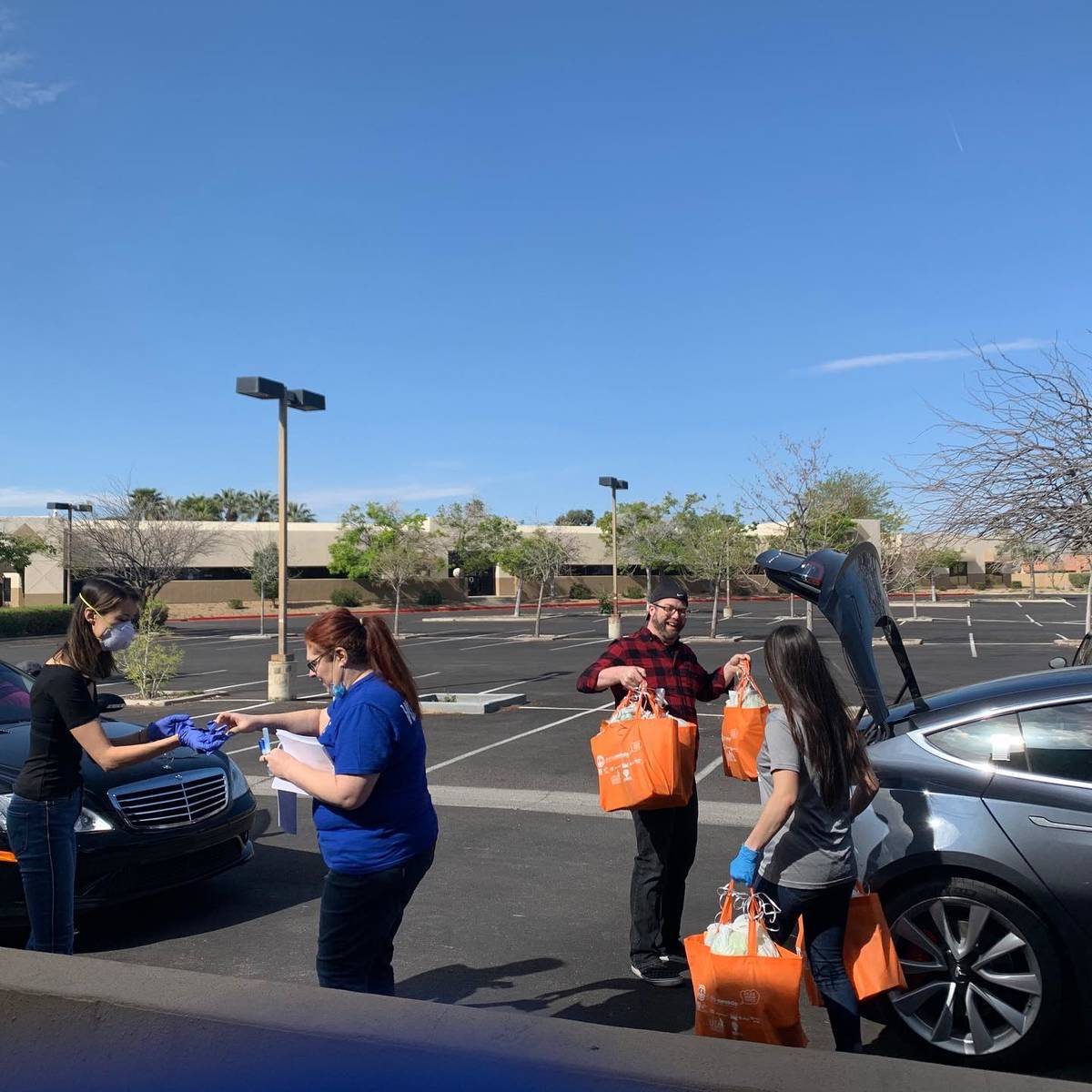 Volunteers from Jewish Family Services Agency delivered baskets of matzoh, gefilte fish, macaro ...