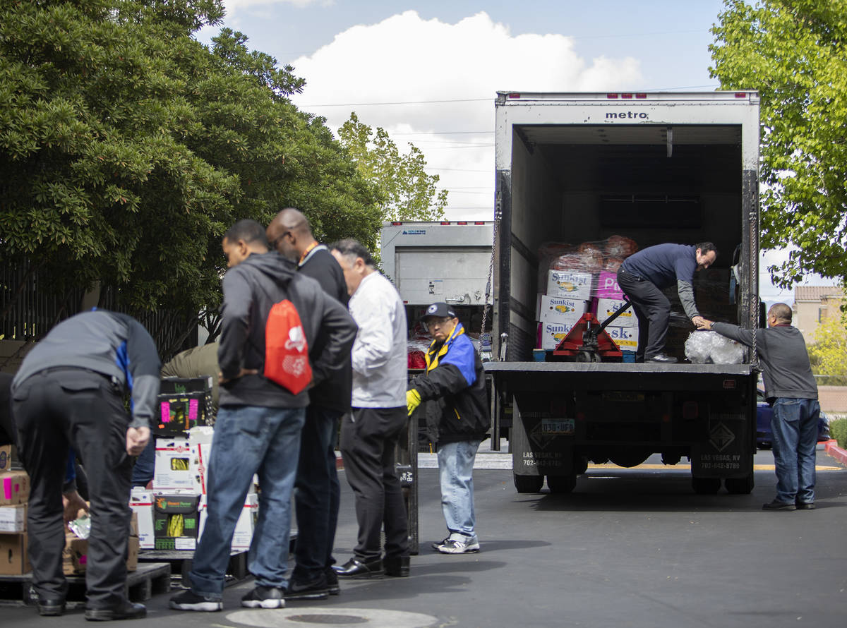 Metropolitan police and a group of MGM chefs teamed up to distribute food MGM restaurants can n ...