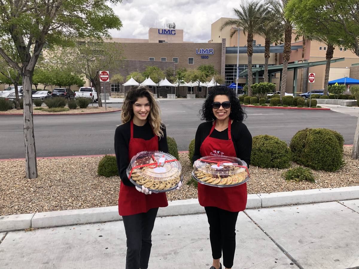 CurlyTop Baker gourmet cookie company recently delivered trays of cookies to first responders a ...