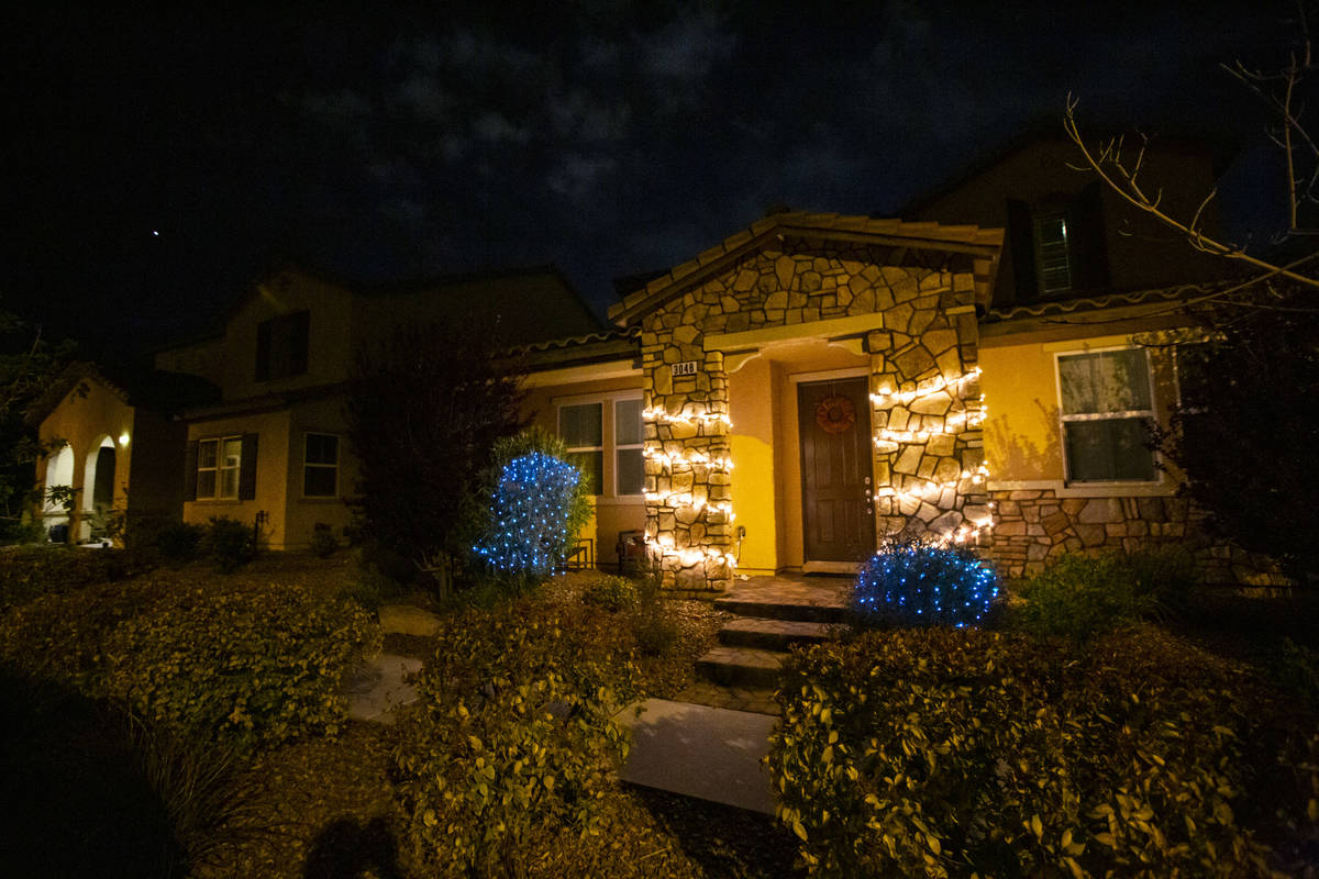 Lights at a home in the Inspirada community in Henderson on Thursday, March 26, 2020. (Chase St ...