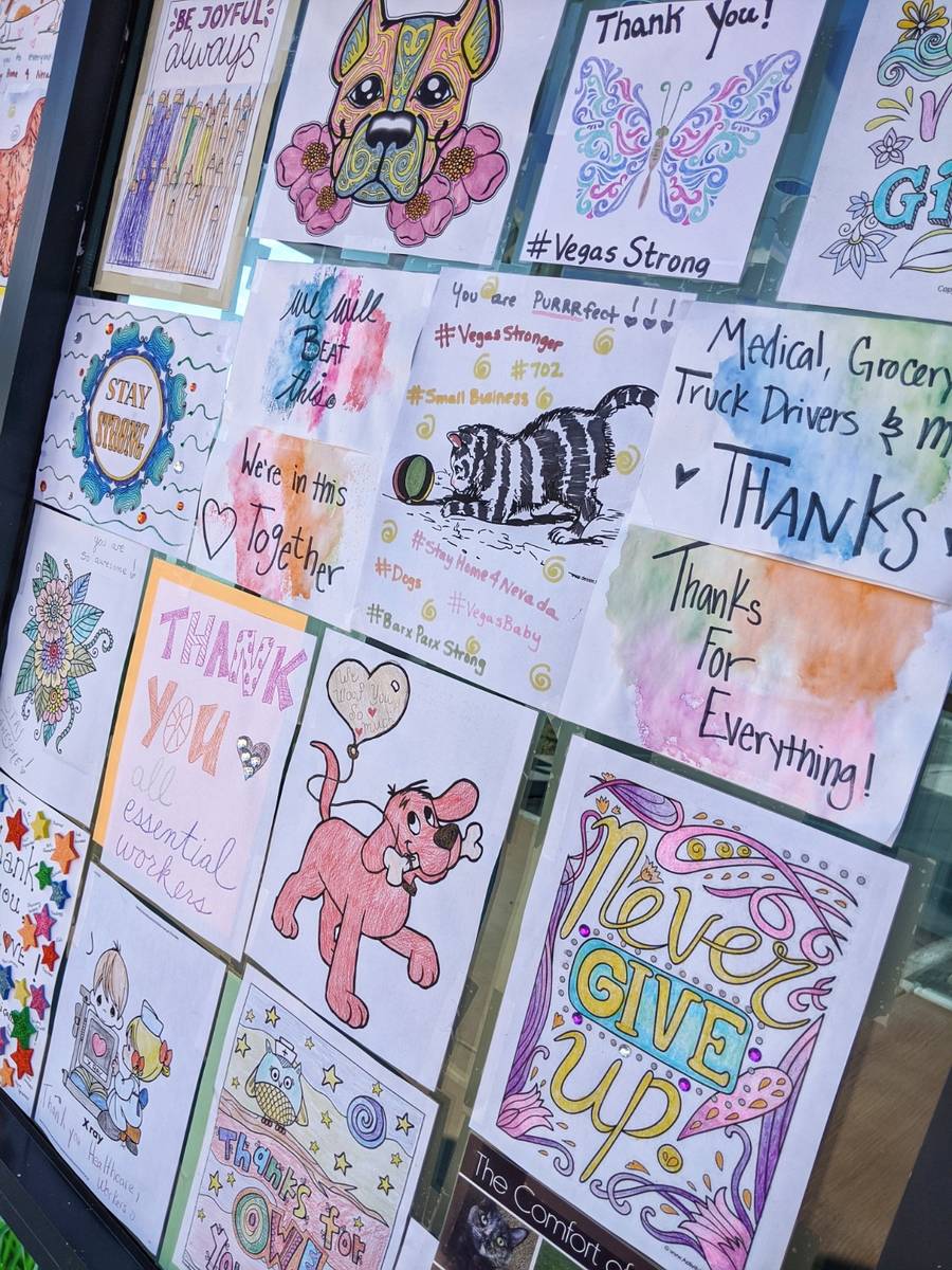Messages of appreciation and support for first responders and others are displayed at Barx Parx ...