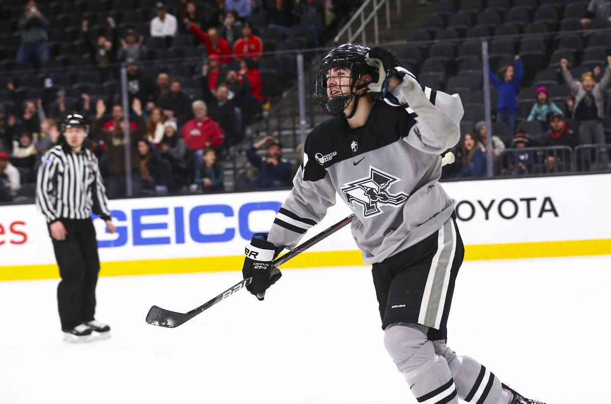 Providence Friars' Jack Dugan reacts after scoring against Cornell to win the game in a shootou ...