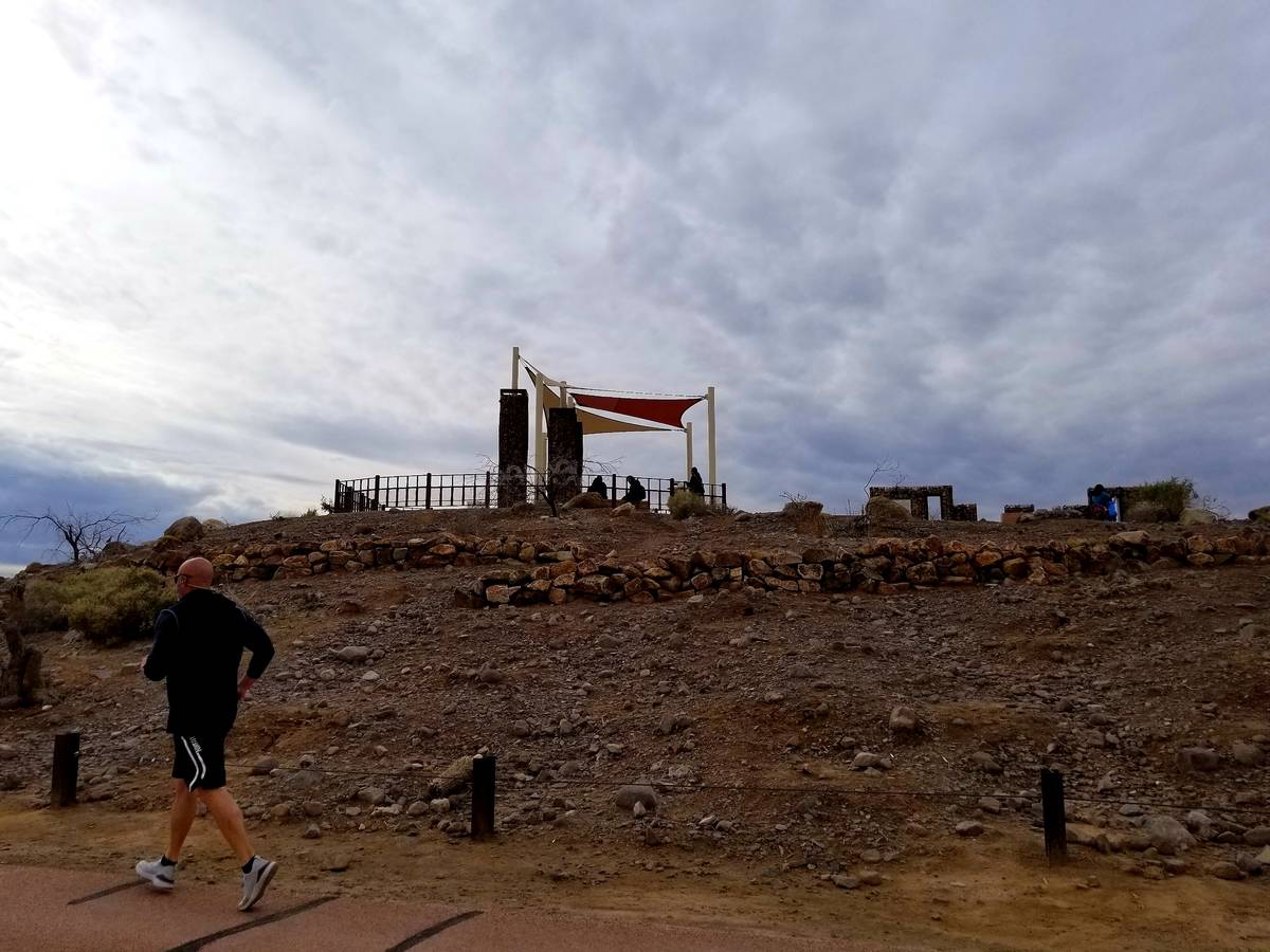 Walkers and runners keeping their social distances while getting fresh air Wednesday at Dunes D ...