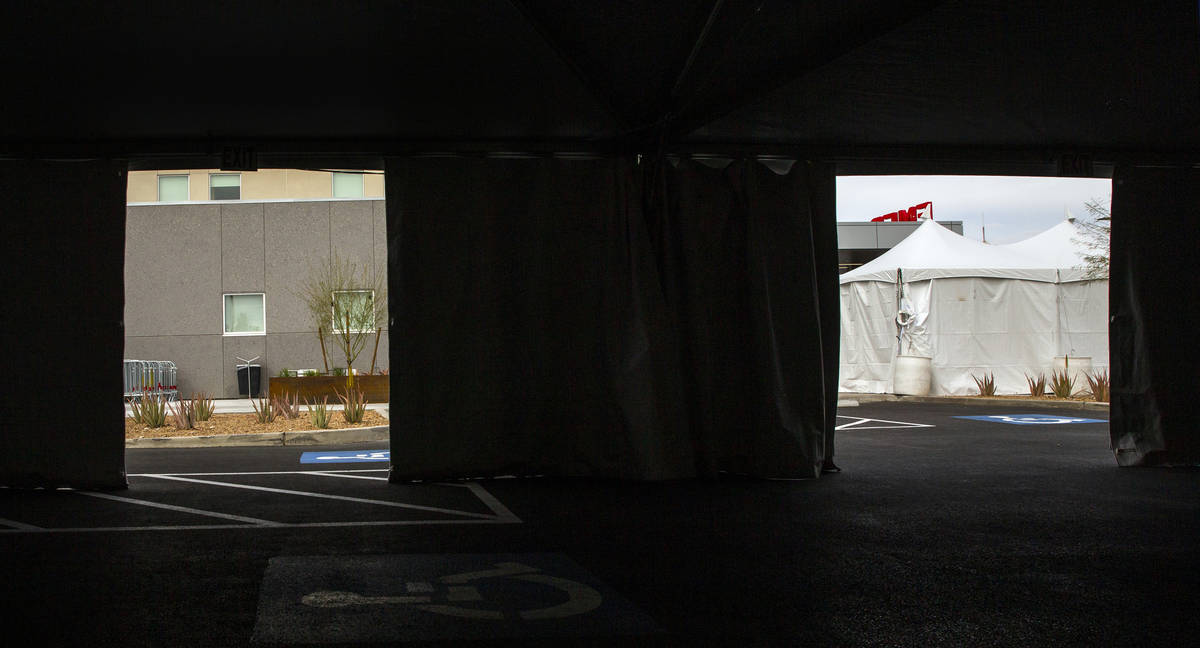 Sunrise Hospital has erected tents, currently empty, in their parking lot near emergency/trauma ...