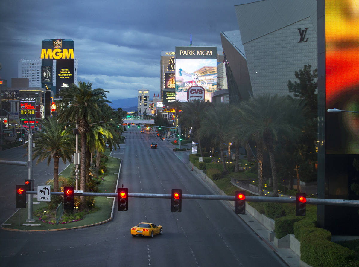 The Las Vegas Strip is largely empty after Gov. Steve Sisolak ordered a mandatory shutdown of m ...