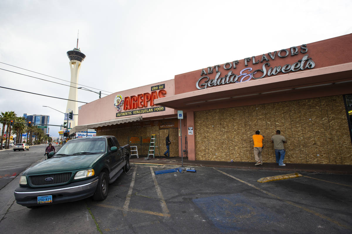Local eateries Viva Las Arepas and Art of Flavors get boarded up after closing for business fol ...