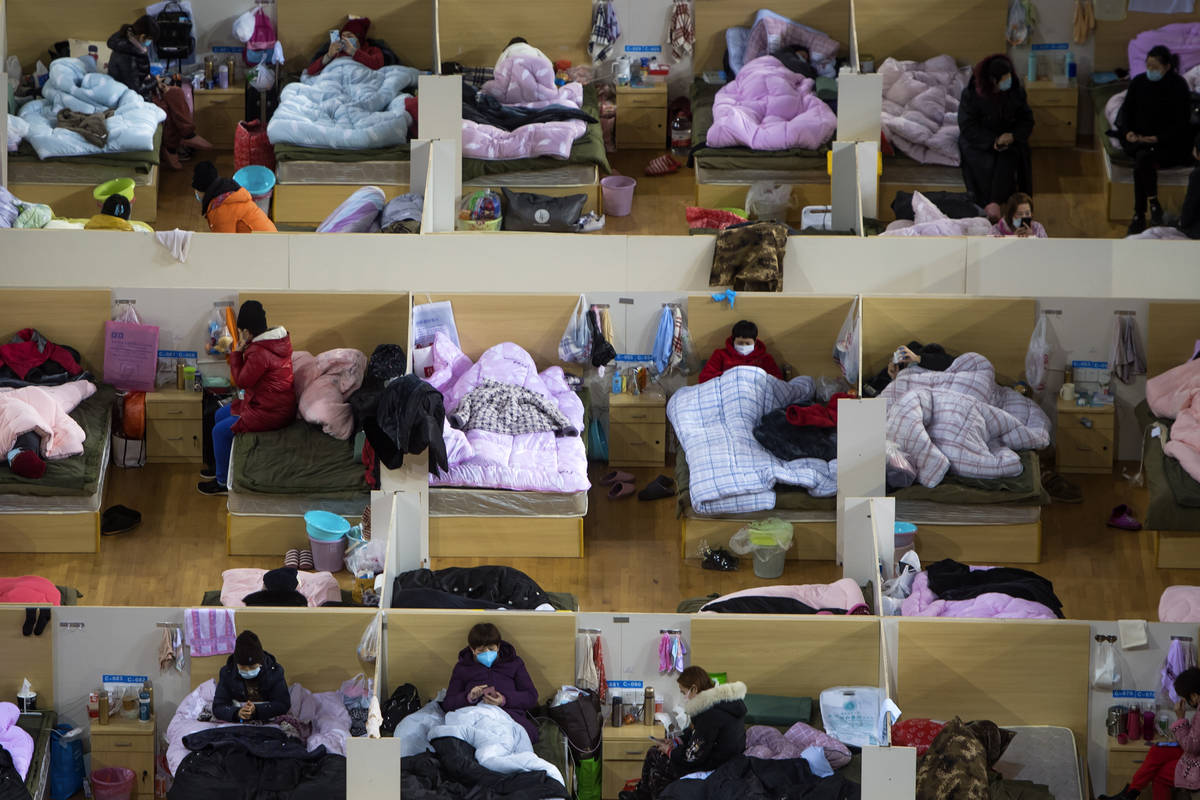 In this Monday, Feb. 17, 2020, photo released by Xinhua News Agency, patients infected with the ...