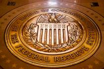 In a Feb. 5, 2018, file photo, the seal of the Board of Governors of the U.S, Federal Reserve S ...