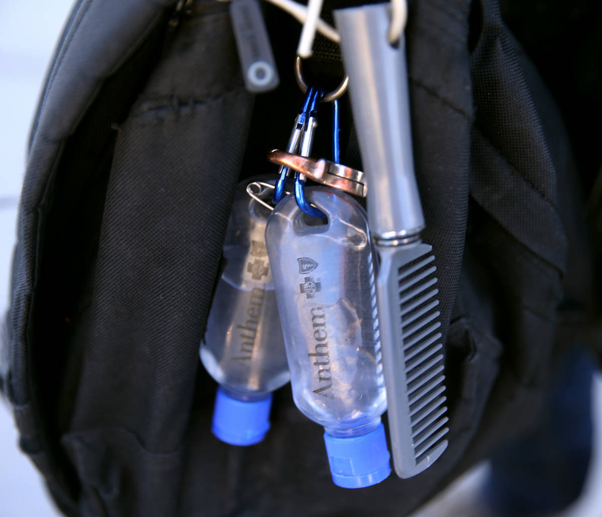Bottles of hand sanitizer on a backpack at The Courtyard Homeless Resource Center in downtown L ...