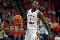 UNLV's Amauri Hardy (3) plays against Utah State during an NCAA college basketball game Wednesd ...