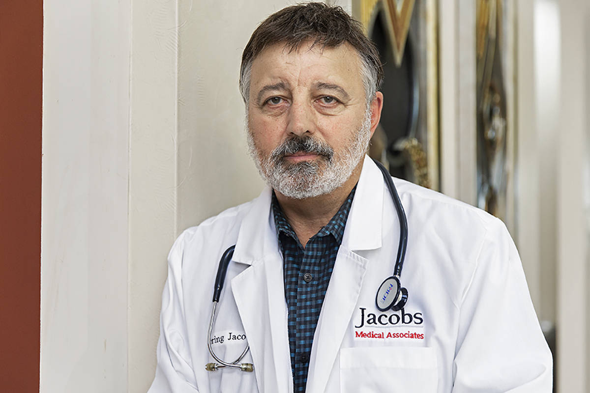 Primary care physician Dr. Loring Jacobs at his office in Henderson on
