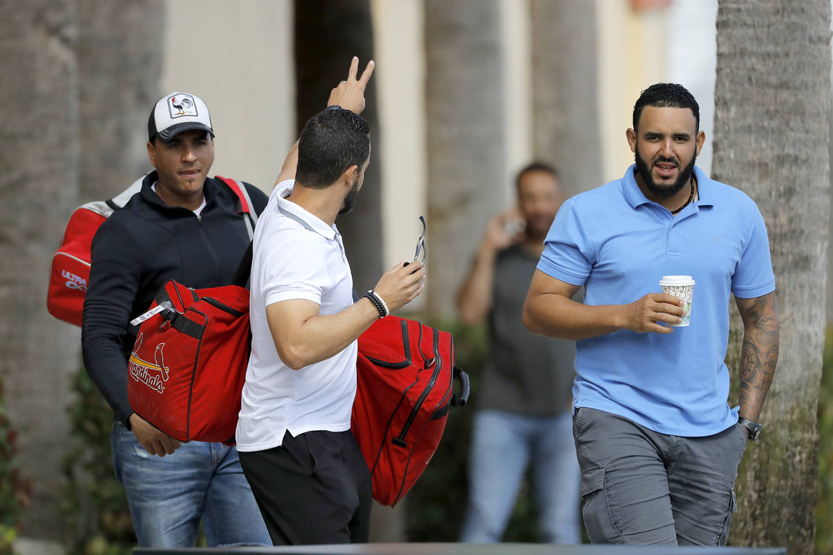 St. Louis Cardinals minor league players leave the team's spring training baseball clubhouse, F ...
