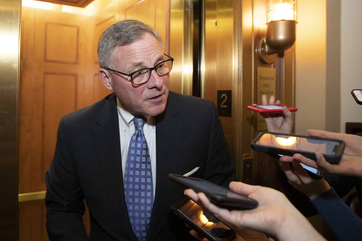 Sen. Richard Burr, R-N.C., speaks with reporters on Capitol Hill, Tuesday, Feb. 4, 2020 in Wash ...