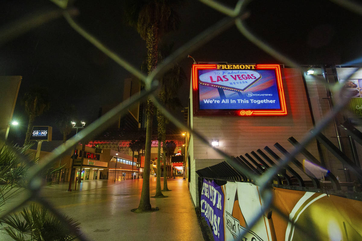 Gates block the entrance to the Fremont Street Experience in downtown Las Vegas, which is close ...